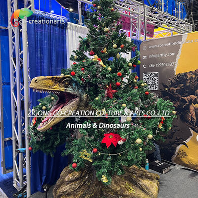 Kopen Kerst Animatronische Raptor Dinosaurus met boom decoratie Voor pretparken en feestdagen Evenementen online vervaardiging